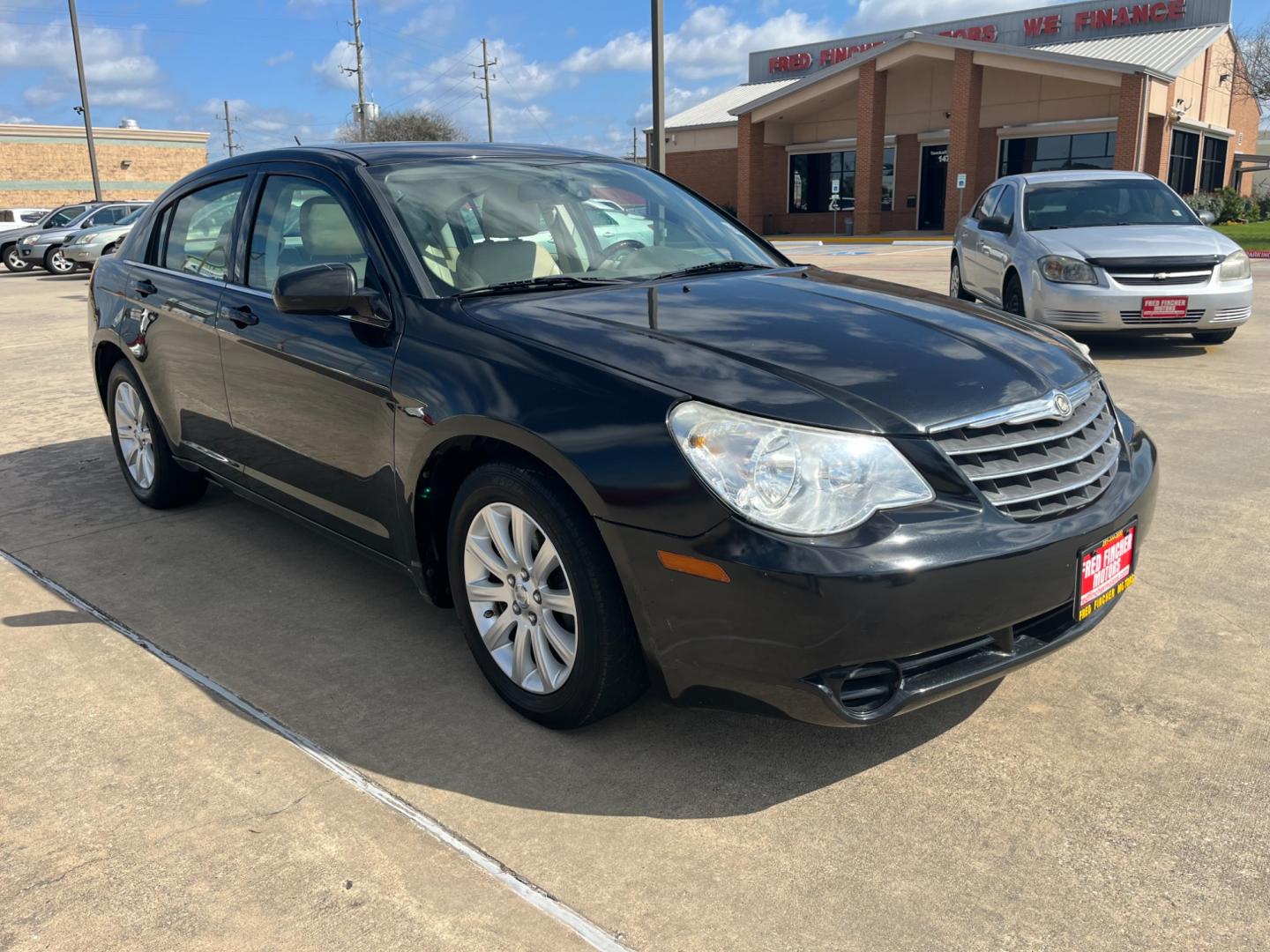 2010 Black /TAN Chrysler Sebring Sedan Limited (1C3CC5FB2AN) with an 2.4L L4 DOHC 16V engine, 4-Speed Automatic transmission, located at 14700 Tomball Parkway 249, Houston, TX, 77086, (281) 444-2200, 29.928619, -95.504074 - Photo#0